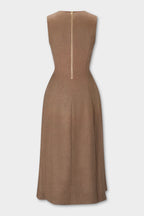 Laverne Midi Dress, sleeveless brown dress shown from the back, featuring a structured bodice, a central gold zipper, and a flared skirt, set against a light gray background.