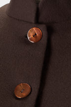 Detail of the mandarin collar and terracotta mother of pearl buttons on the Corbu Jacket