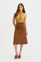 Kingma A-Line Skirt in burnt rust, high-waisted silhouette, front view