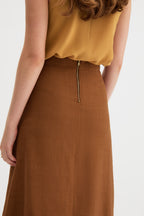 Kingma A-Line Skirt in burnt rust, three-quarter view