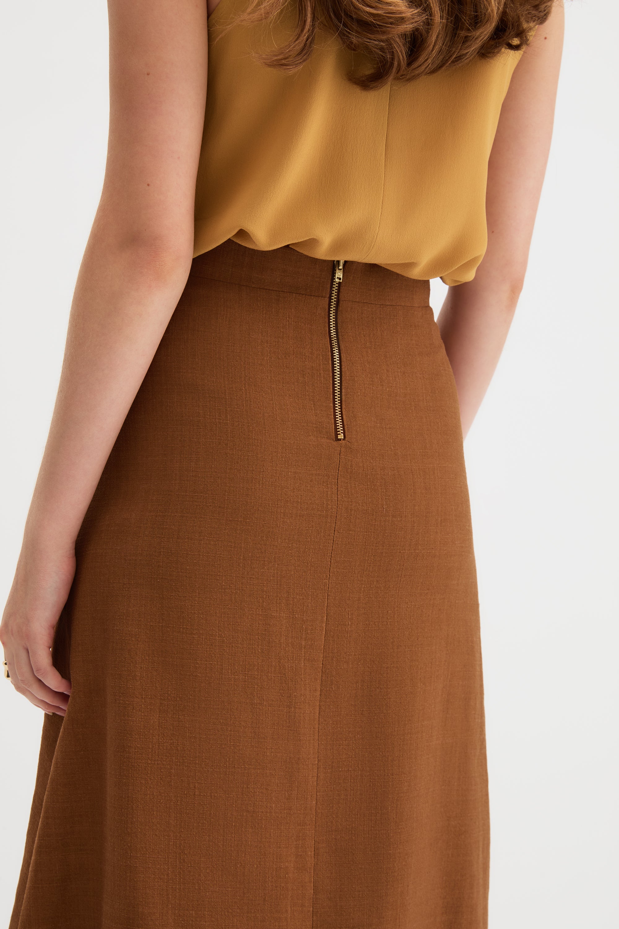 Kingma A-Line Skirt in burnt rust, three-quarter view