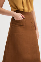 Kingma A-Line Skirt in burnt rust, close-up view